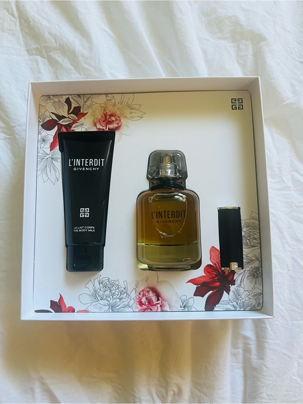 Givenchy L'Interdit set. Lipstick is color red.